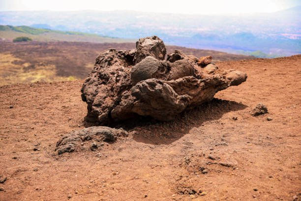 Large volcanic rock on a ground in Etna mountain in Sicily, Italy