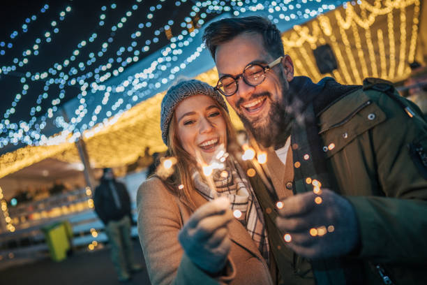 istock Couple holding sparklers 2192439495
