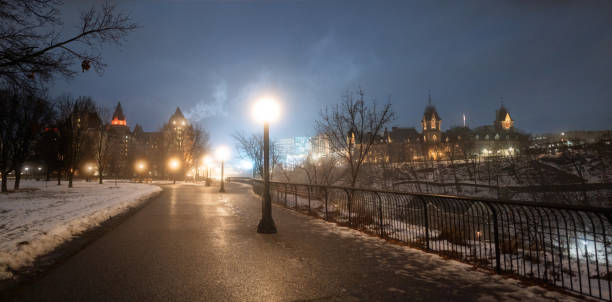 Parliament Hill in Ottawa, Ontario Canada with foggy conditions.