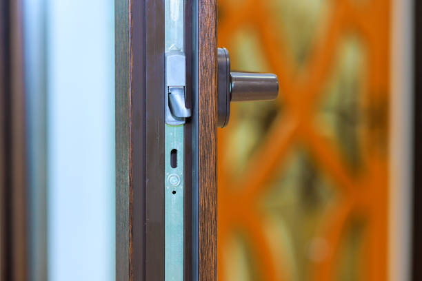 istock Door handle installation in modern interior with stylish patterned glass background 2192449583