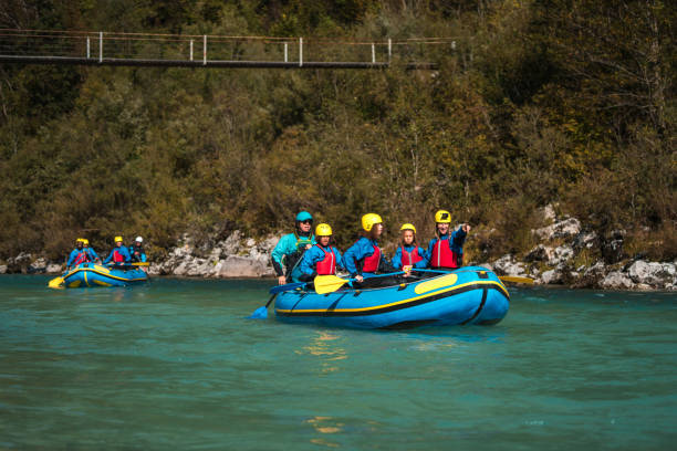 istock Mixed Race Crew on Blue Raft Adventure 2192449879