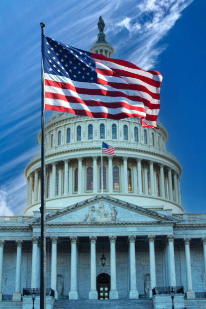 istock Washintgton DC with US flag waving 2192452864