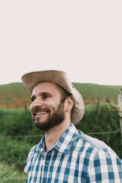 istock Smiling farmer in the plantation 2192453399