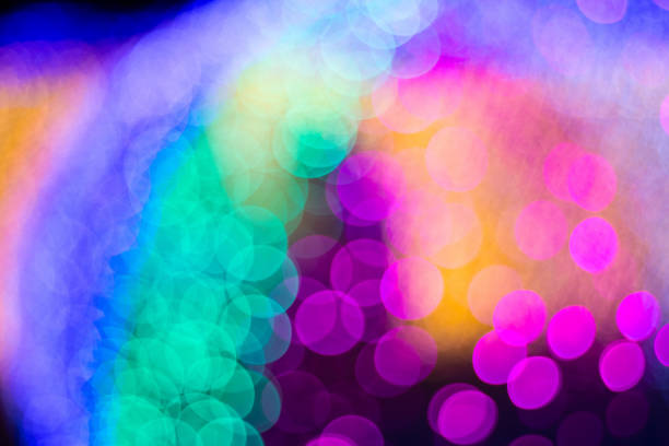 A captivating display of blurred lights in a rainbow palette, perfect for creating a festive or magical atmosphere