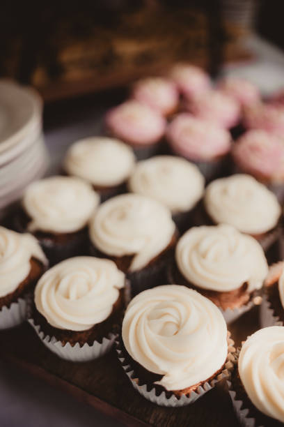 istock White and pink wedding cupcakes on a dessert table 2192459463