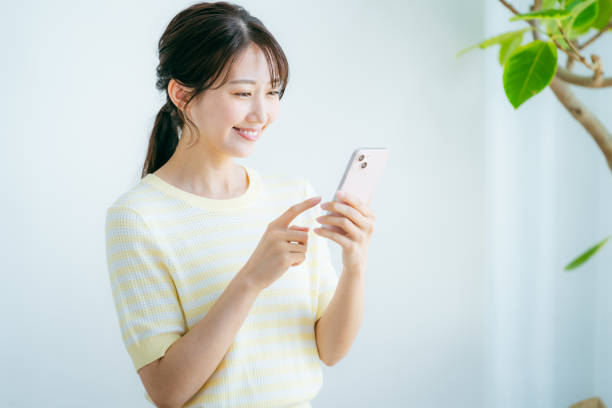 istock young woman calling on smartphone 2192461968