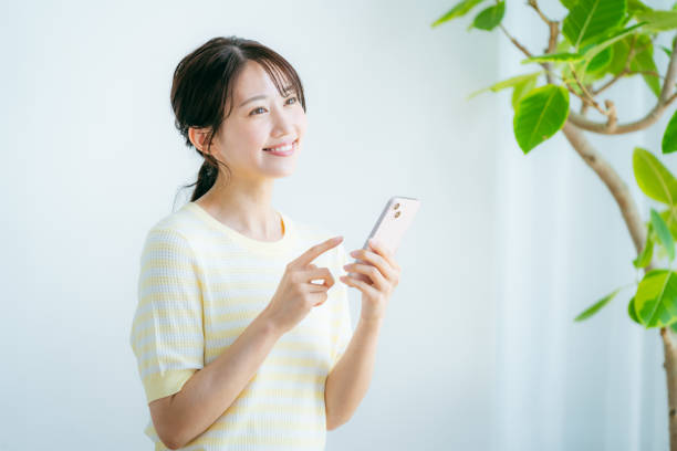 istock young woman calling on smartphone 2192461969