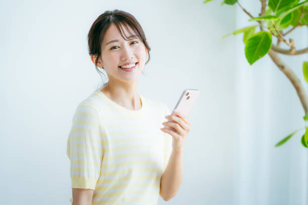 istock young woman calling on smartphone 2192461972