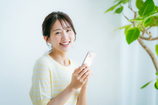 istock young woman calling on smartphone 2192461978