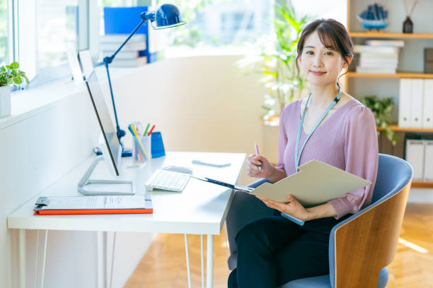 istock business woman working in the office 2192462030