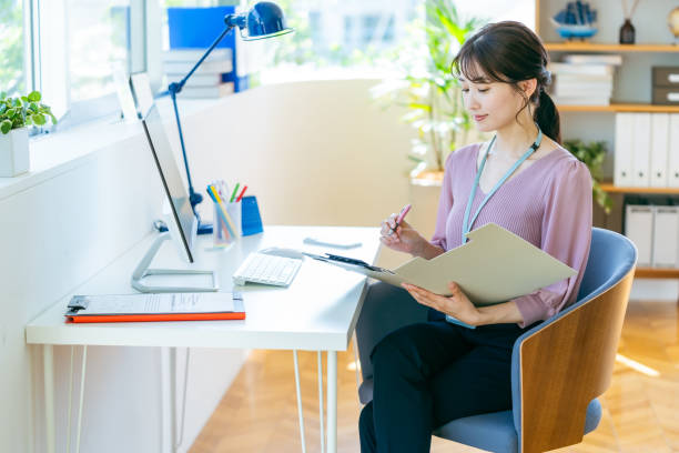 istock business woman working in the office 2192462031