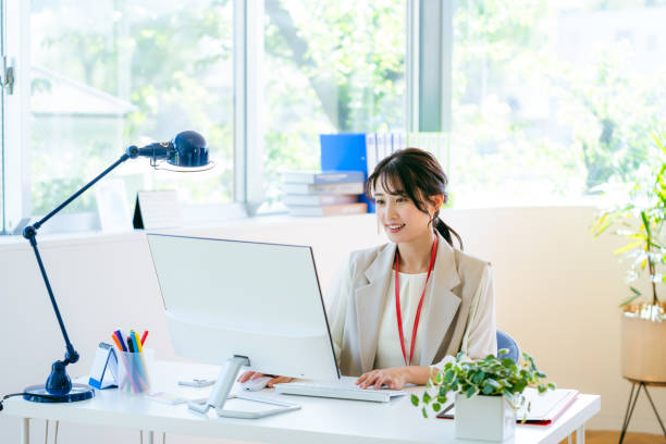 istock business woman working in the office 2192462033
