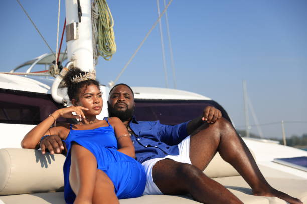 istock A vibrant Black couple enjoying quality time together on a yacht while celebrating the female's birthday. 2192463708