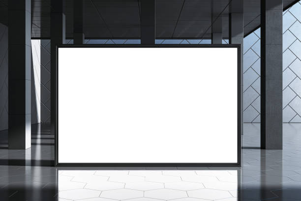 istock Blank white digital display or poster mockup in a modern interior space with tiled walls and floor, surrounded by dark elements. 3D Rendering 2192466483