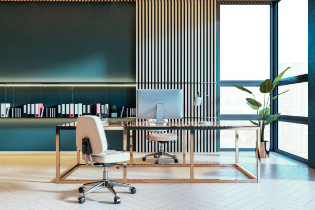 istock Modern executive office interior with desk, chair, and computer in a spacious room with striped walls and tall glass windows. 3D Rendering 2192466531