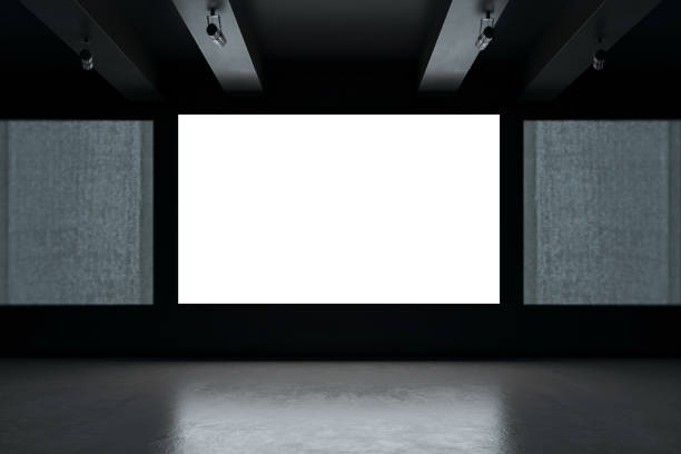istock Blank digital display screen in a modern dark exhibition hall with ceiling lights. 3D Rendering 2192466571