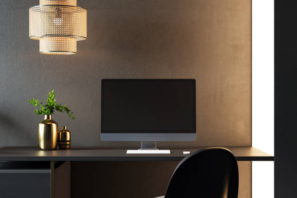 istock Minimalistic workspace with desktop computer, keyboard, mouse, and decorative vases on a wooden desk in a modern, well-lit room. 3D Rendering 2192466587