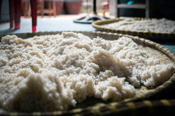 In some Vietnamese villages like Ban village in Hung Yen Province, soy sauce is still made in the traditional way. Locals soak and boil rice before it is left for two days to turn yellow with fungus, where they mix it with soybeans, salt and water. The earthen jars are filled with the mixture and covered tightly for a few months till the fermentation process is completed.
