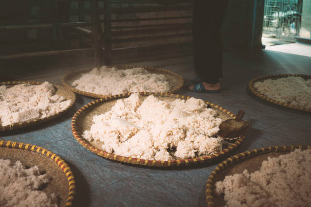 In some Vietnamese villages like Ban village in Hung Yen Province, soy sauce is still made in the traditional way. Locals soak and boil rice before it is left for two days to turn yellow with fungus, where they mix it with soybeans, salt and water. The earthen jars are filled with the mixture and covered tightly for a few months till the fermentation process is completed.