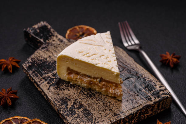 istock Piece of cheesecake with nuts and berries with winter pattern 2192467259