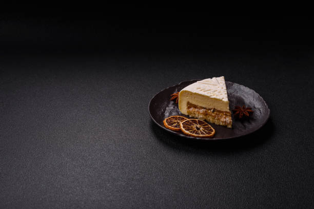 istock Piece of cheesecake with nuts and berries with winter pattern 2192467275