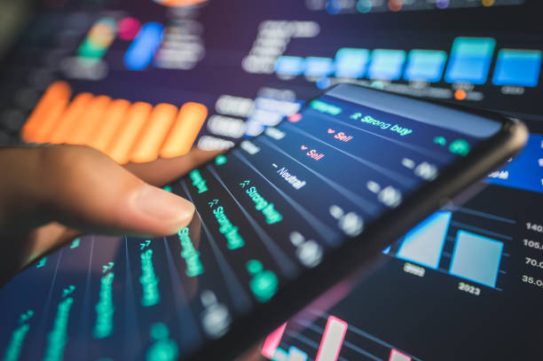 istock business professional reviewing printed analytics with digital data overlays for ai insights  machine learning concepts data reports with futuristic 2192471020