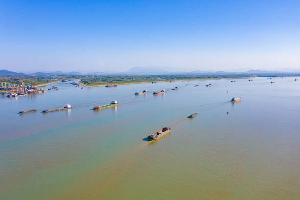 The Tongling Yangtze River Bridge in China has many cargo ships here