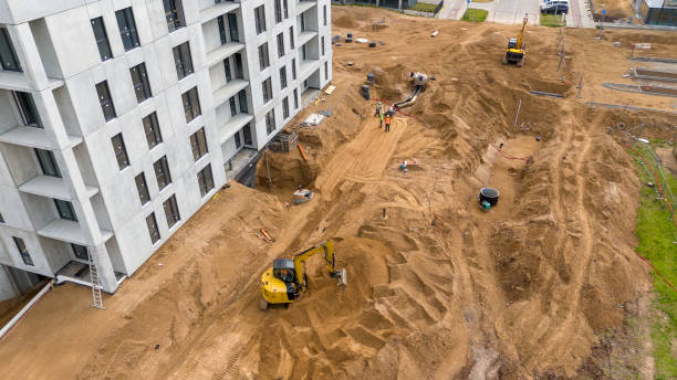 istock Aerial View of a Construction Site with Heavy Machinery 2192473743