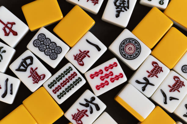 istock Mahjong tiles lined up on a black background 2192474726