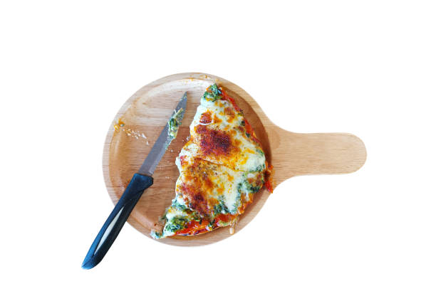 Spinach and Cheese Pizza Italian food cut in half.