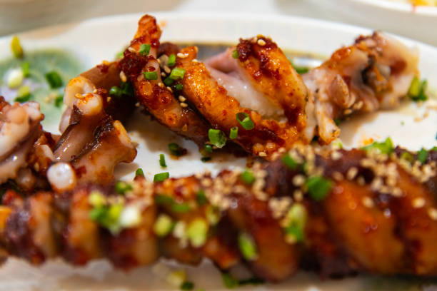 istock spicy grilled octopus skewers 2192477534