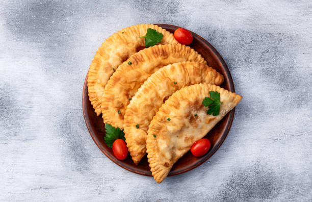 istock Snack chebureks. Pasties with meat photography . Top view 2192478649