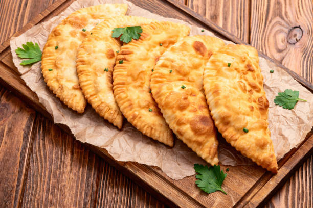 istock Snack chebureks. Pasties with meat photography . Top view 2192478659
