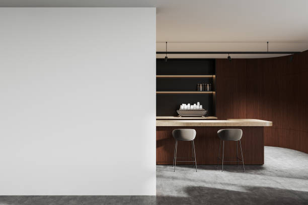 istock Minimalistic white wall mockup next to wooden bar counter in modern interior design. 3D Rendering 2192479421