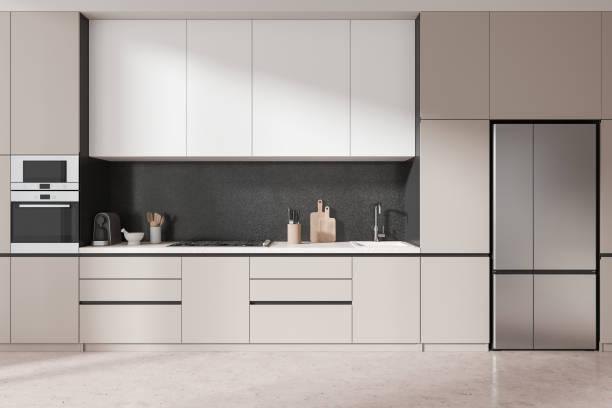 istock Modern kitchen interior with refrigerator, appliances, and cabinets in neutral tones design. 3D Rendering 2192480524