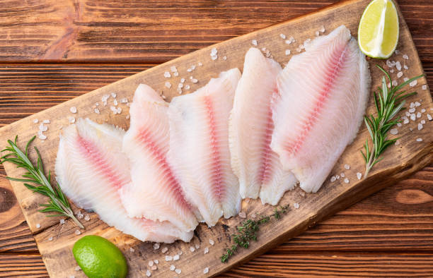 istock Raw tilapia fillet photography . Top view 2192480740
