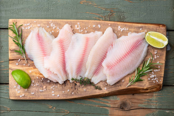 istock Raw tilapia fillet photography . Top view 2192480758