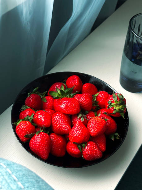 strawberries in a glass bowl