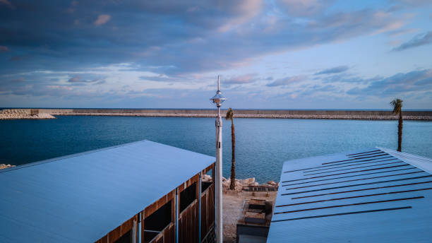 istock Lightning Rod Overlooking Serene Coastal Waters 2192483476