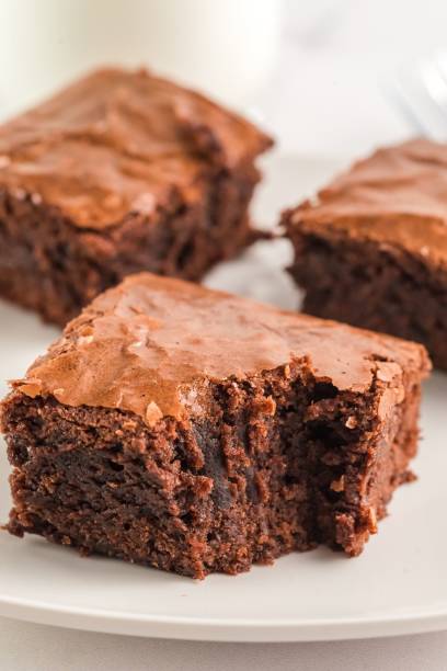 istock Fudgy chocolate brownies on a plate. 2192485265