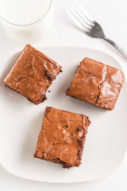 istock Delicious chocolate brownies with milk 2192485294