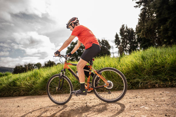 istock Senior man cycling on dirt road 2192487901