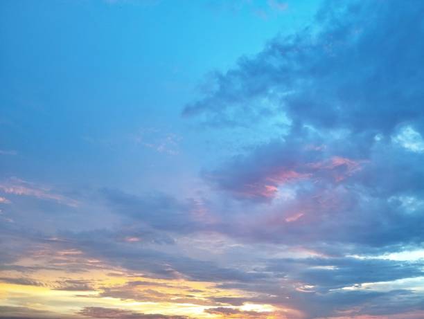 istock Colorful and peaceful sunset with red-tinted clouds. Natural background Concept 2192488547