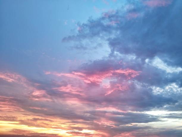 istock Colorful and peaceful sunset with red-tinted clouds. Natural background Concept 2192488557