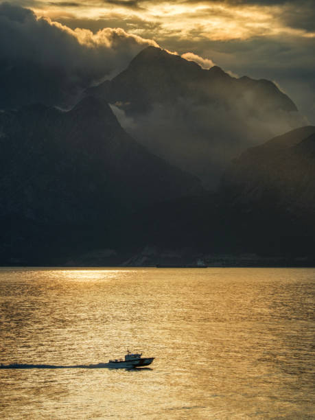 istock Coast guard boat speeding across Antalya Bay during sunset. 2192488654