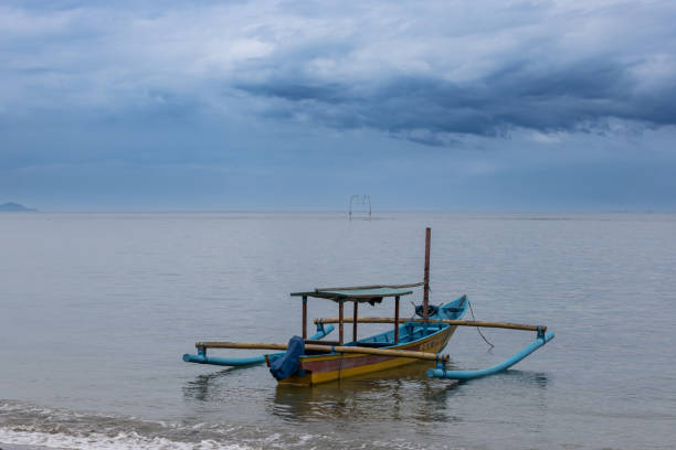 Fishing boat on Sanur beach, Bali Island - Indonesia.