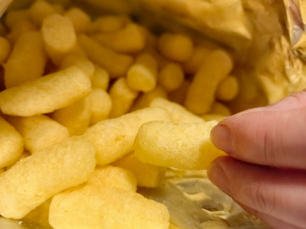 istock Crispy snack delights in a golden bag ready for tasting and sharing 2192490069