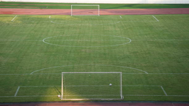 istock Football pitch with green meadow 2192491808