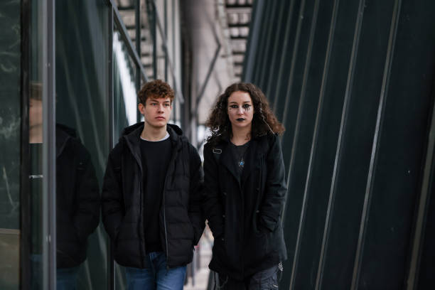 istock Duo in black walking in the urban jungle 2192494555