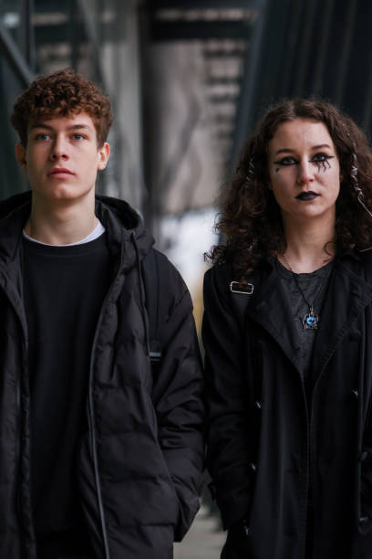 istock Teens in black on the street 2192494600
